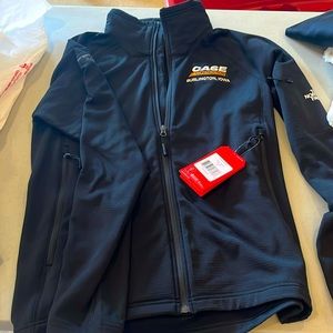North face jacket with Case Construction logo size M